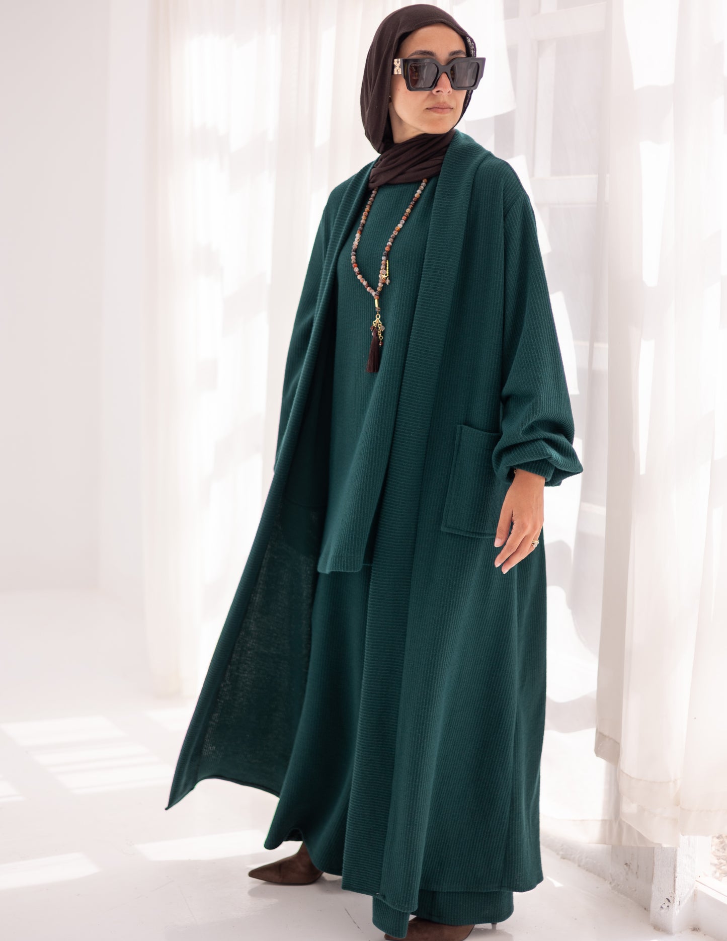 Knitted woolen set in Dark green