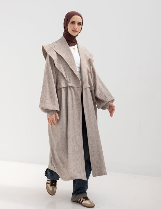 Trendy Lenin cardigan with golden dots in cafe