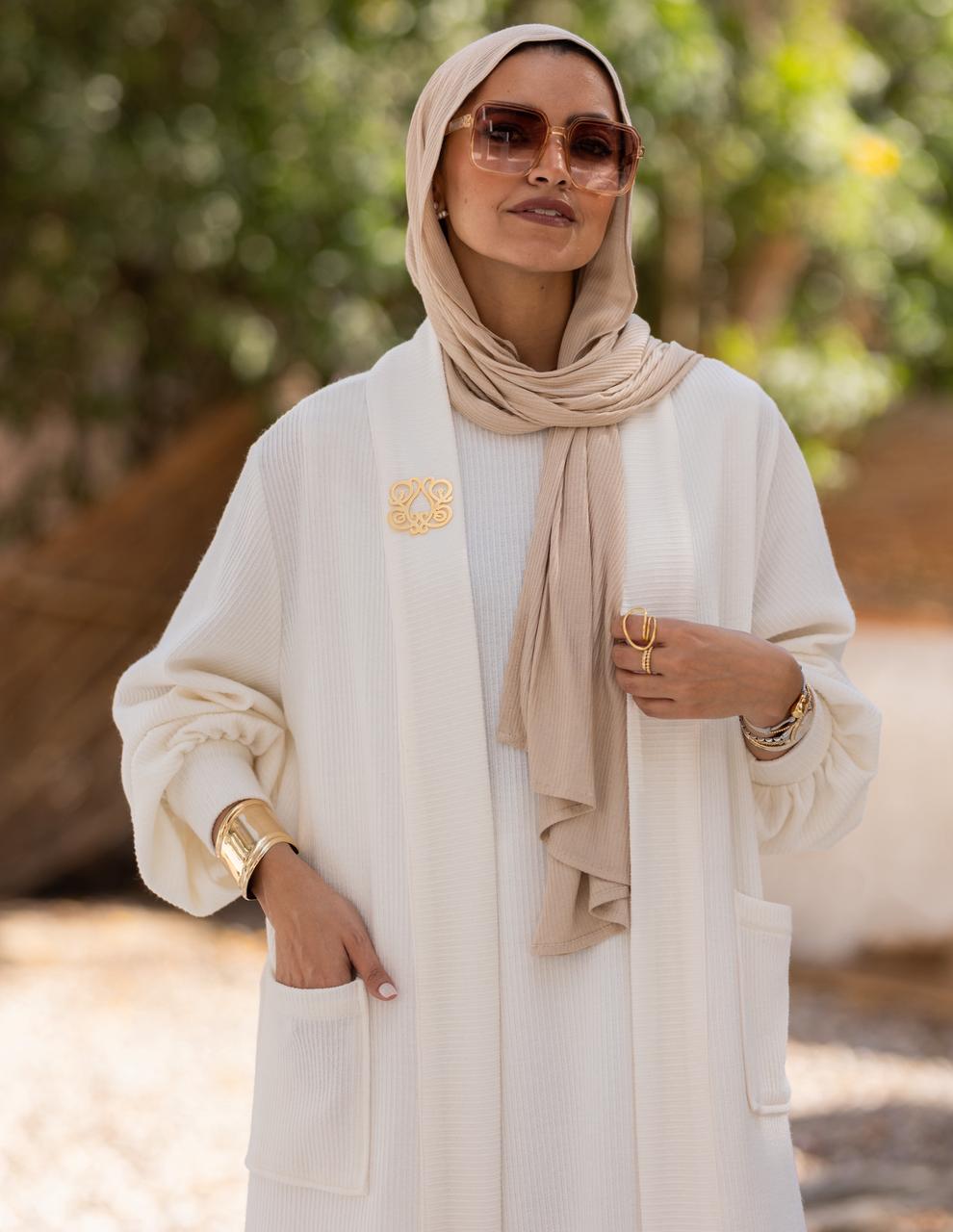 Iconic golden brooch