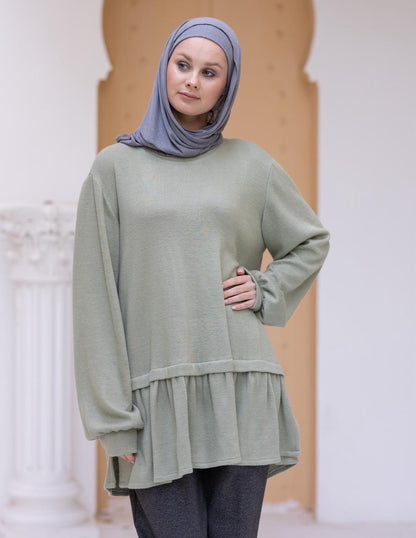 Cashmere pullover with ruffles