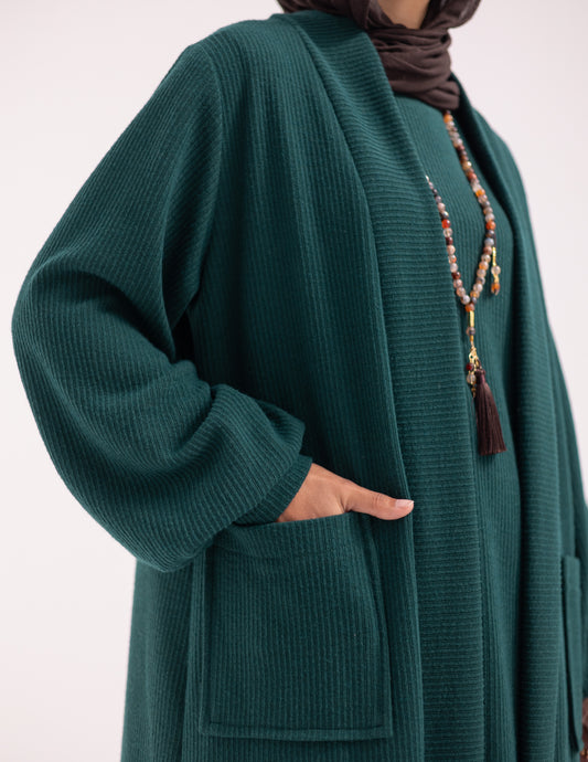 Woolen knitted cardigan with pockets in Dark green