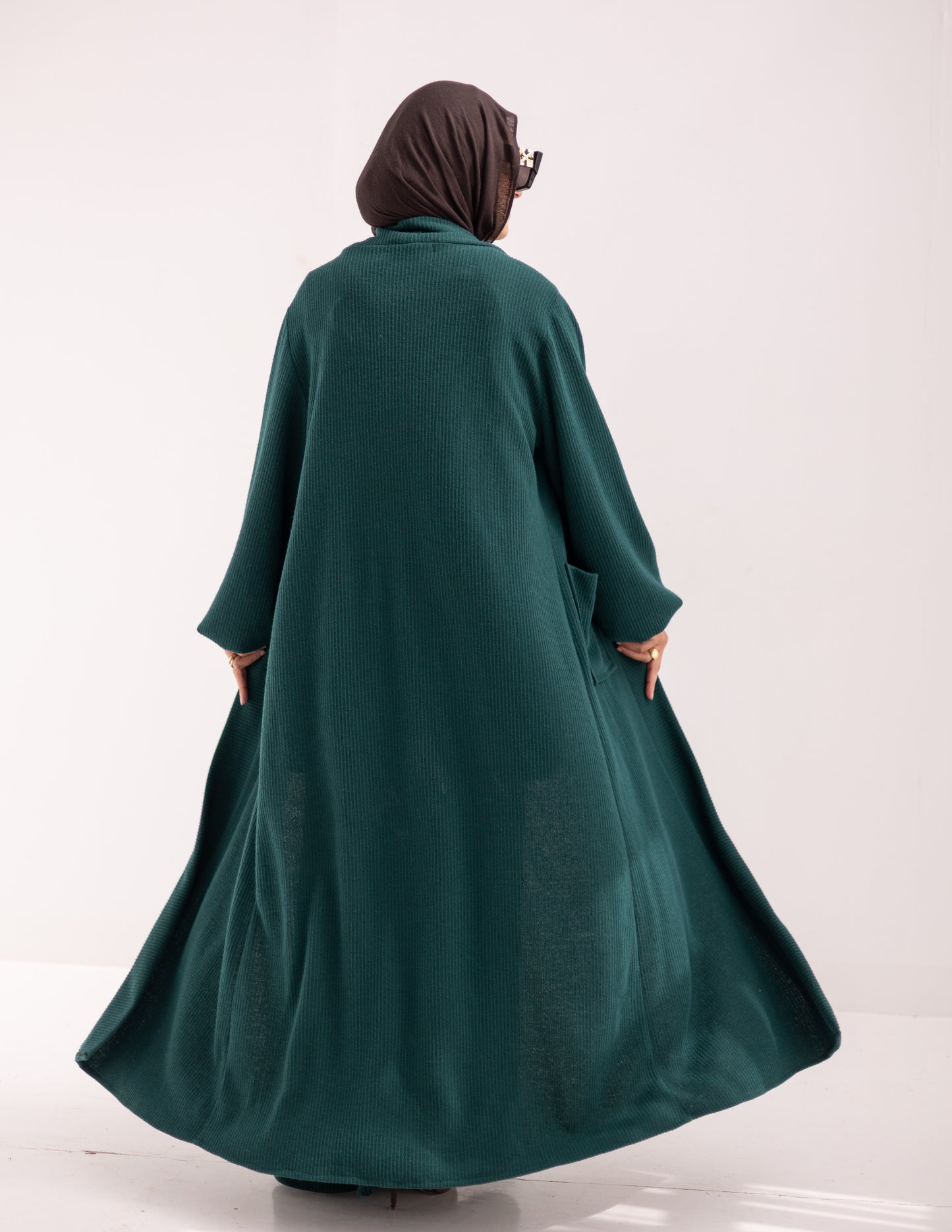 Woolen knitted cardigan with pockets in Dark green