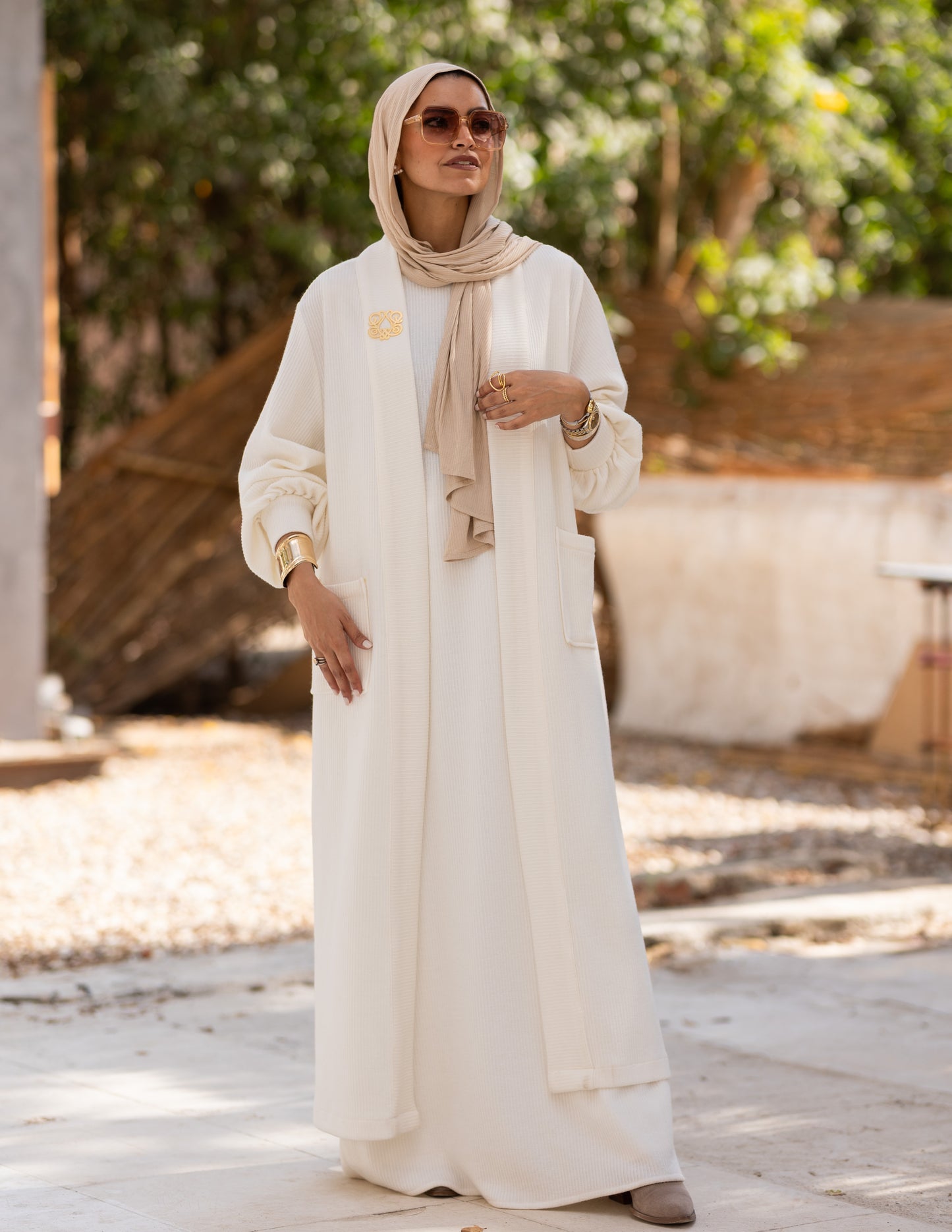 Woolen knitted cut dress in Off white