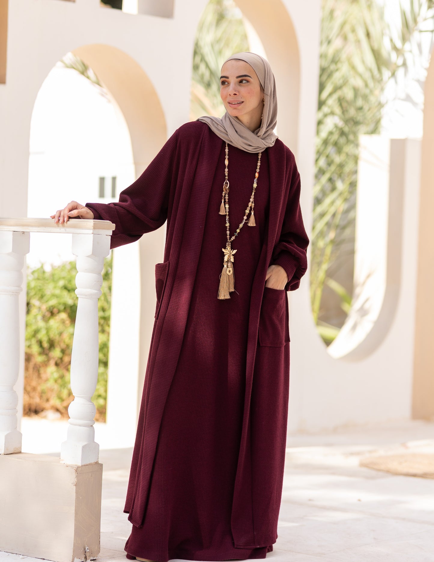 Woolen knitted cut dress in Burgundy