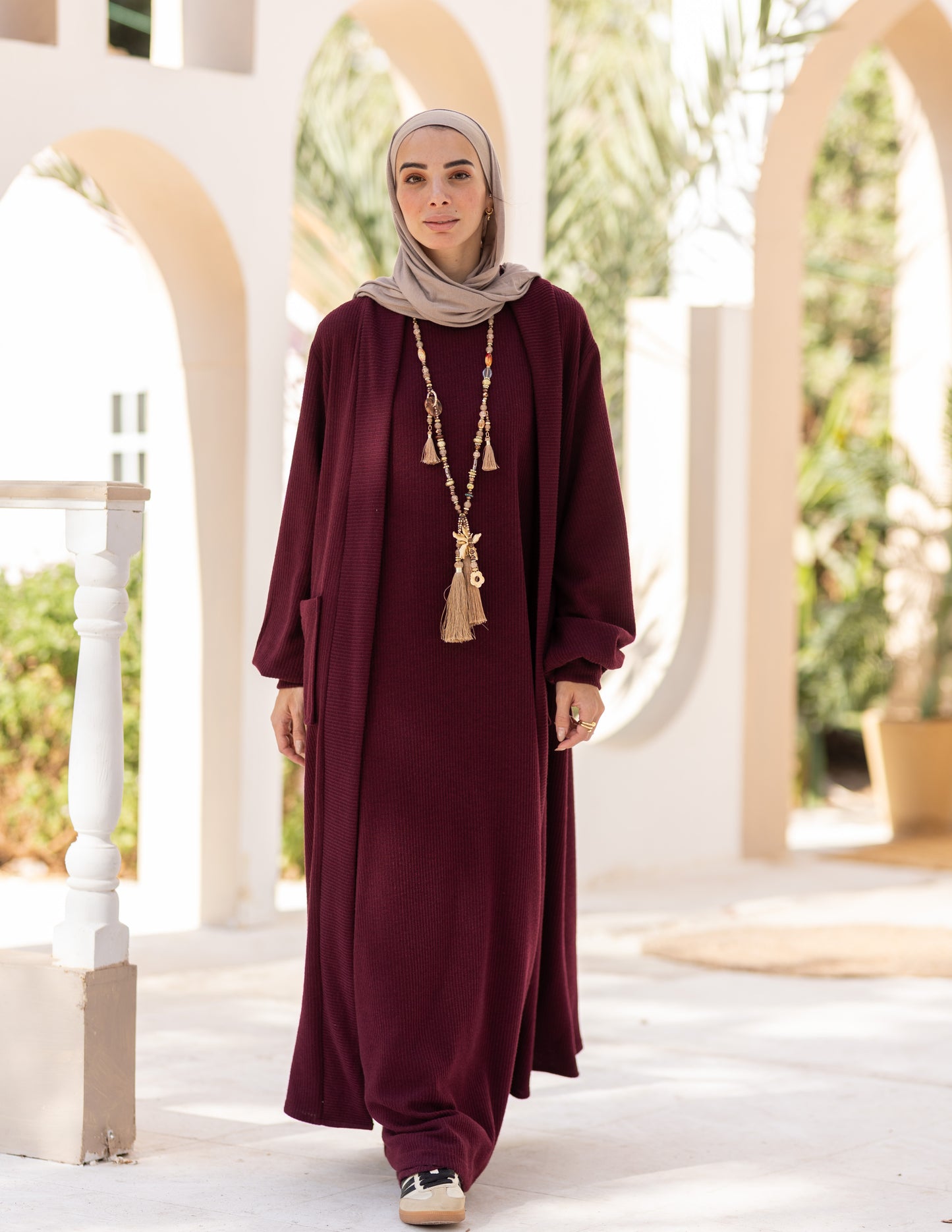 Woolen knitted cut dress in Burgundy