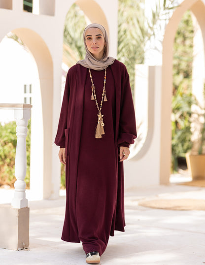 Woolen knitted cut dress in Burgundy
