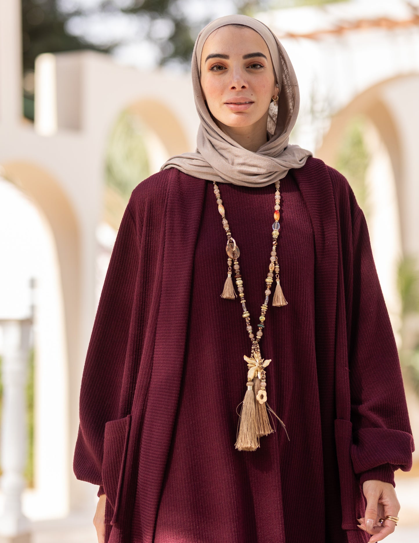 Woolen knitted cut dress in Burgundy