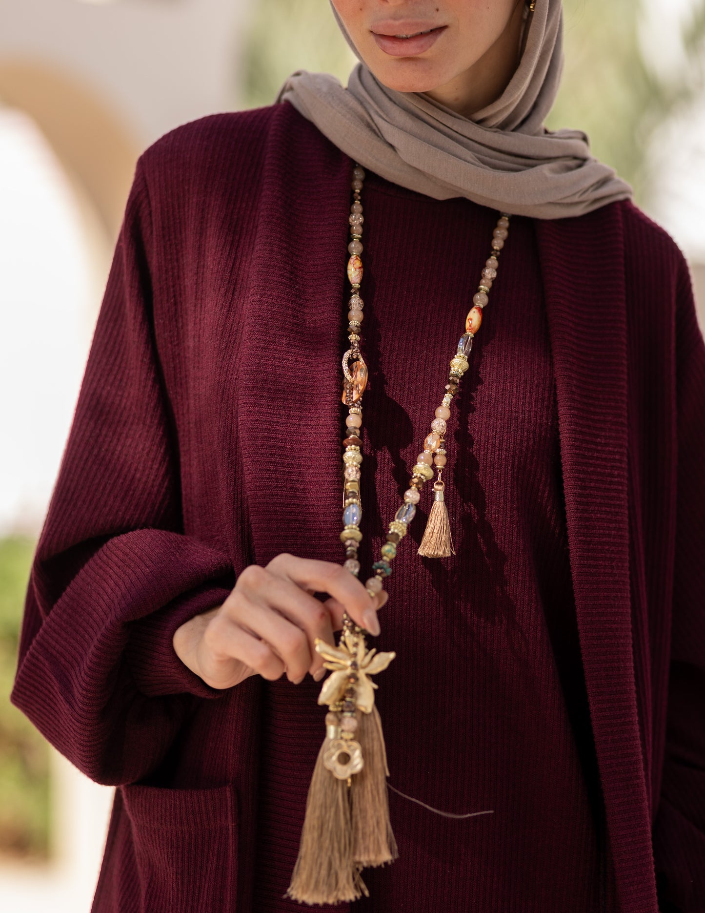 Woolen knitted cut dress in Burgundy