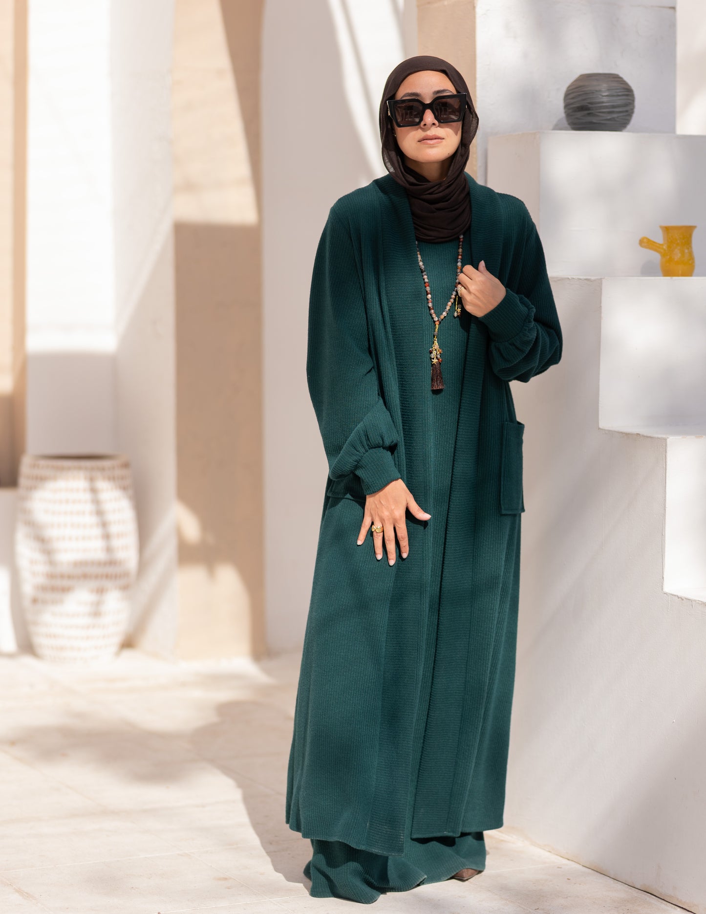 Woolen knitted cut dress in Dark green