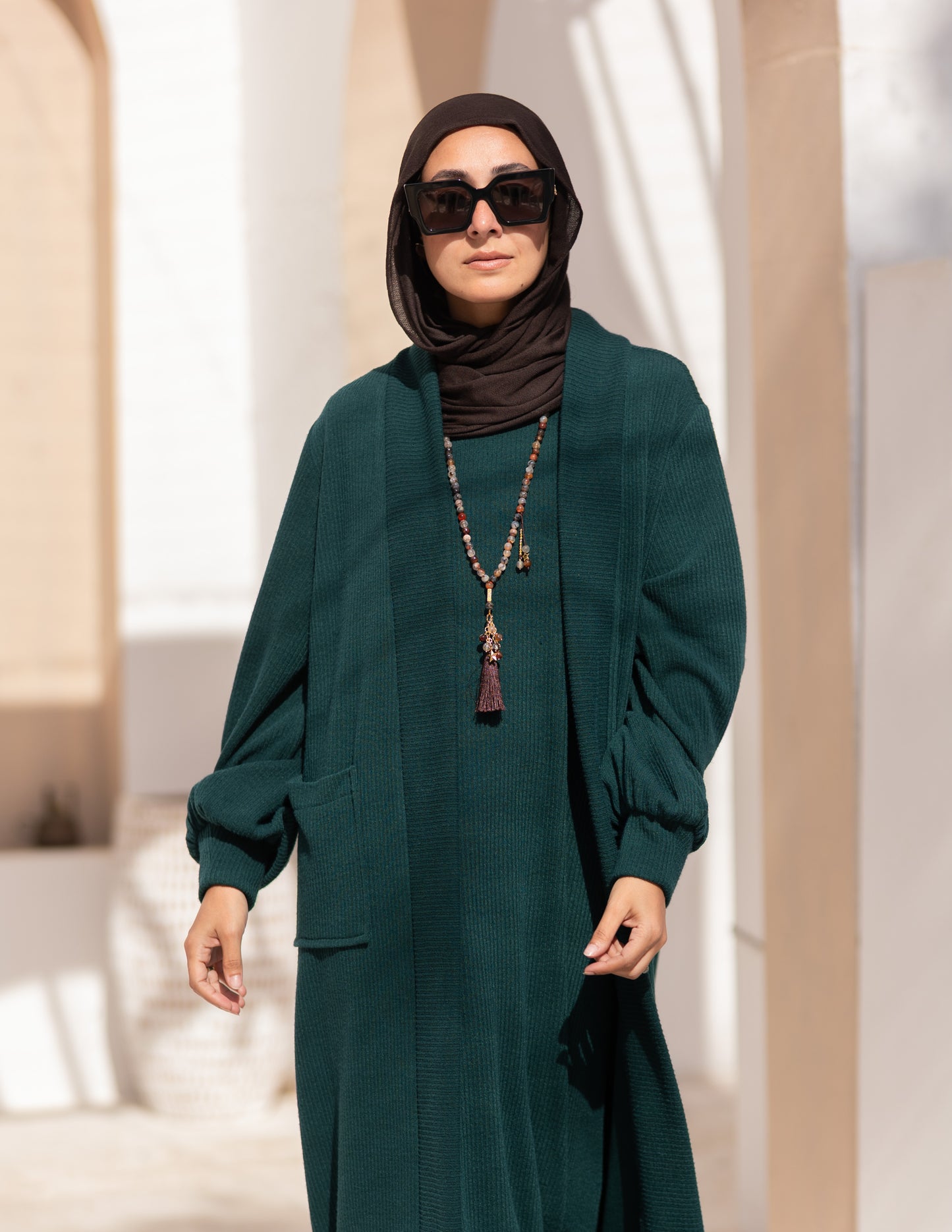 Woolen knitted cut dress in Dark green