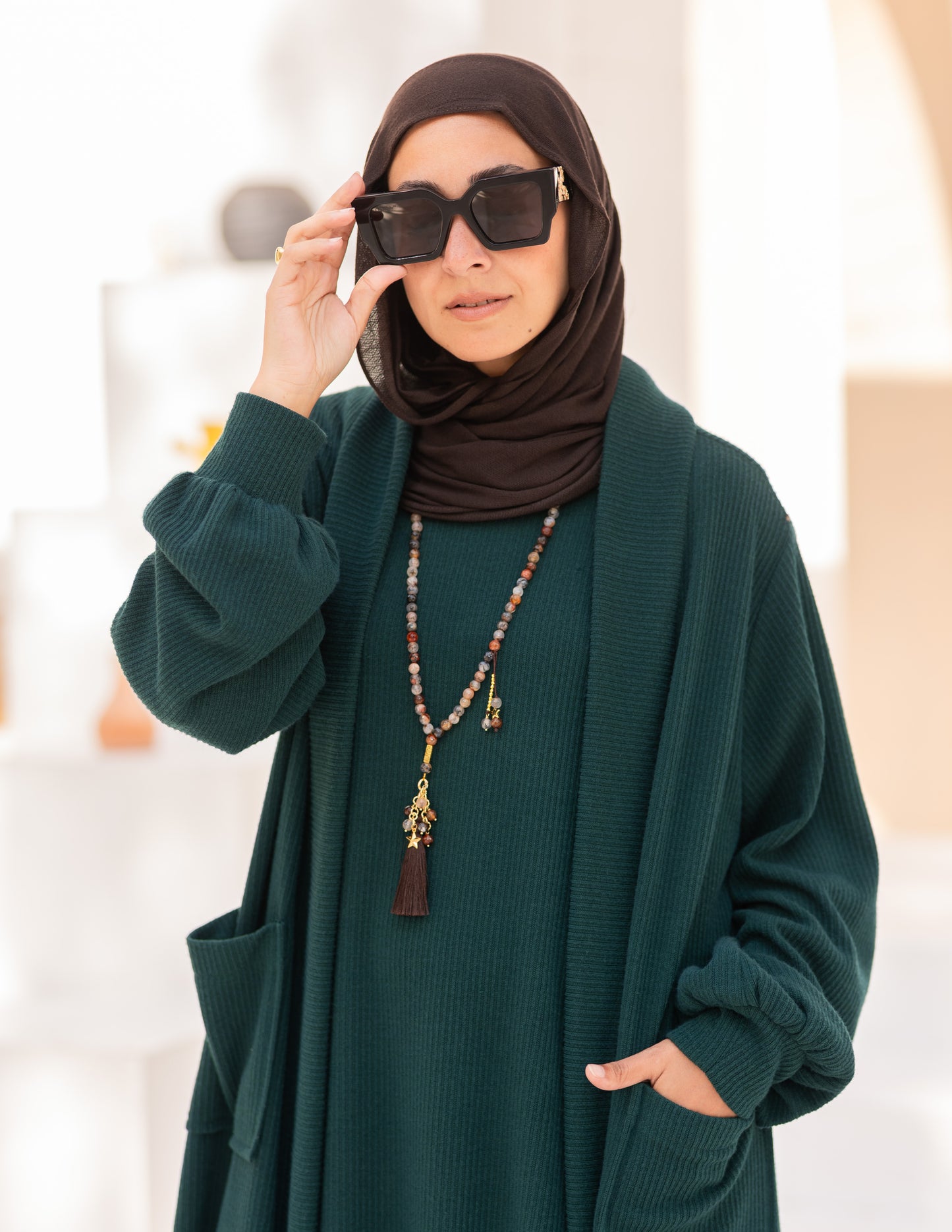 Woolen knitted cut dress in Dark green