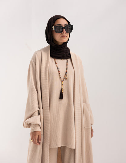 Woolen knitted cardigan with pockets in Beige