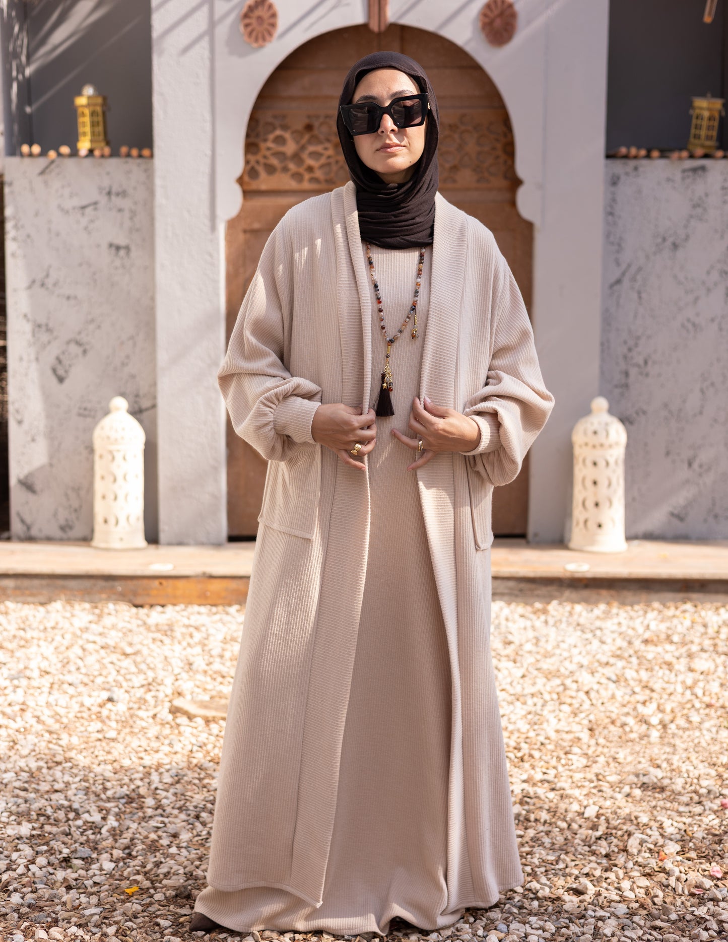 Woolen knitted cut dress in Beige