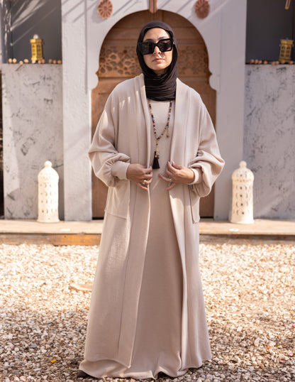 Woolen knitted cut dress in Beige