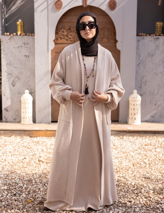 Woolen knitted cut dress in Beige