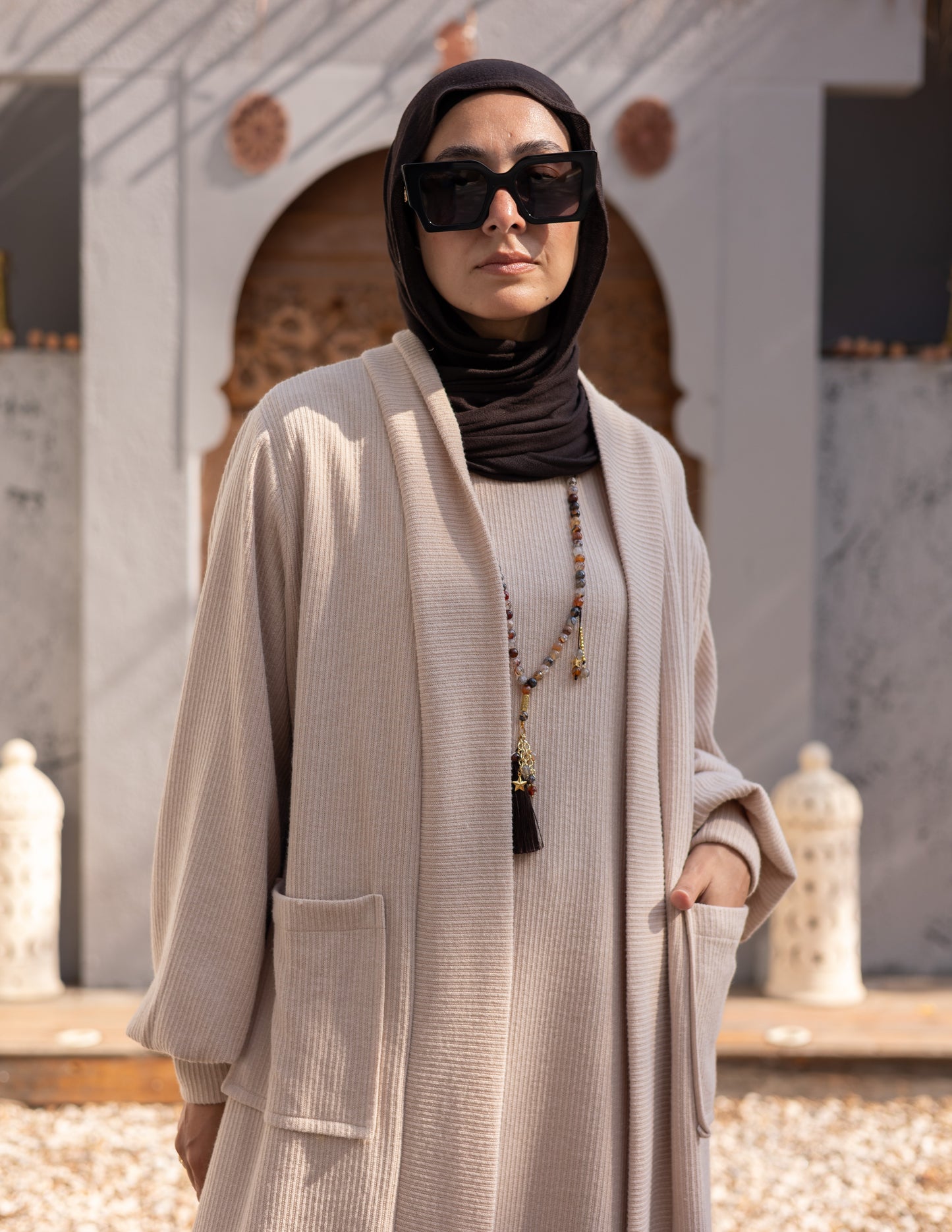 Woolen knitted cut dress in Beige