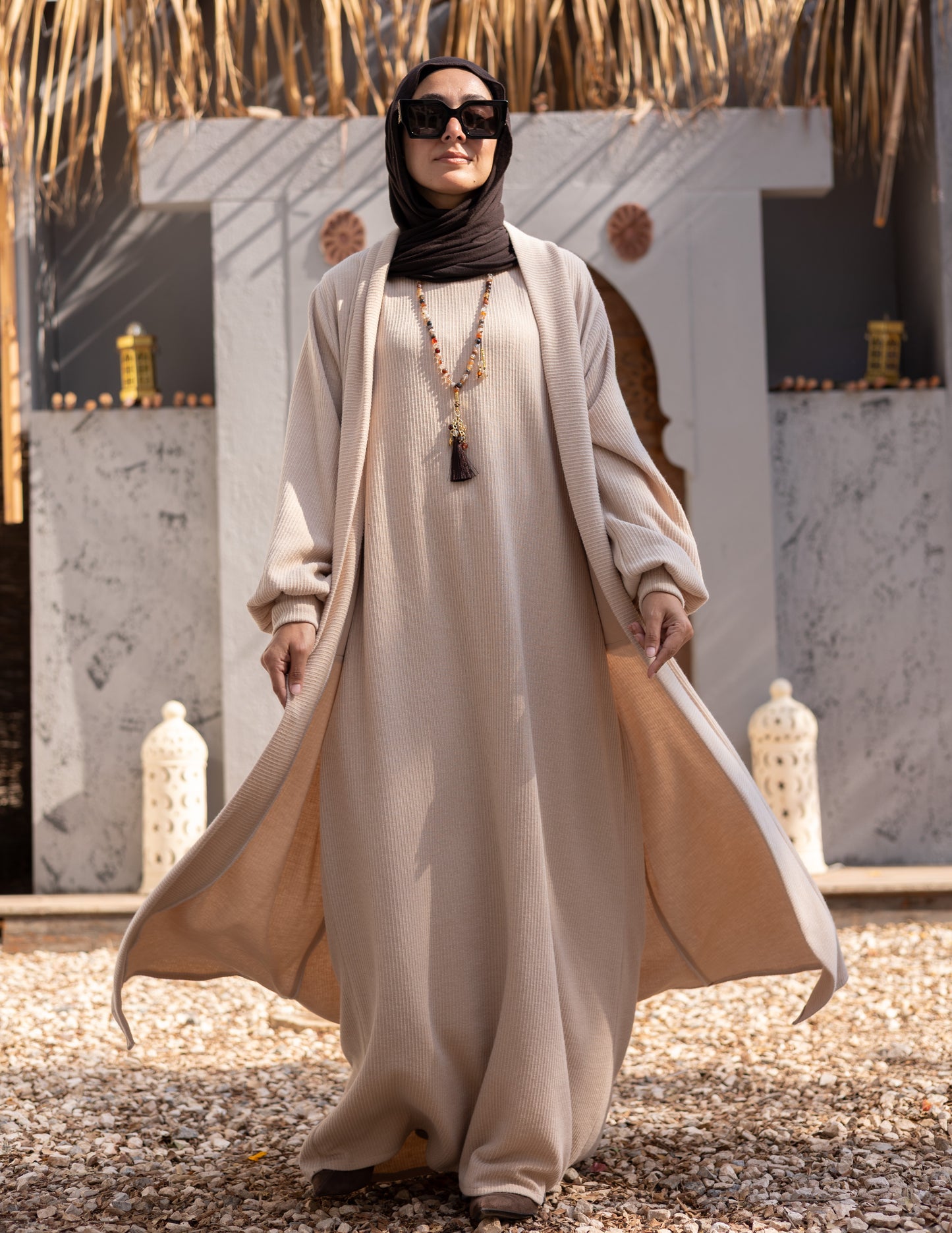 Woolen knitted cut dress in Beige