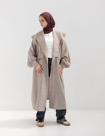 Trendy Lenin cardigan with golden dots in cafe