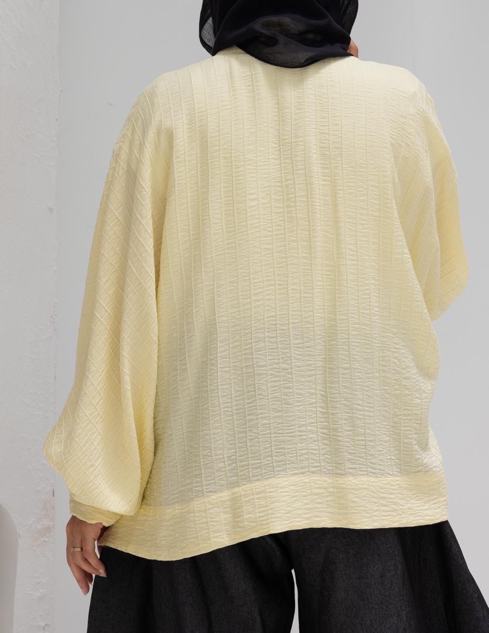 Elegant short blouse with buttons  in Yellow