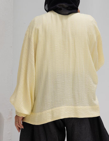 Elegant short blouse with buttons  in Yellow
