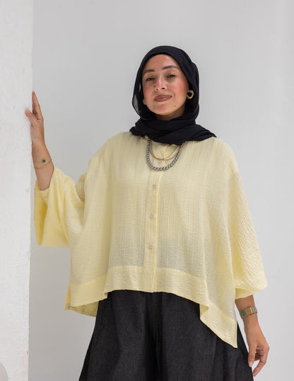 Elegant short blouse with buttons  in Yellow