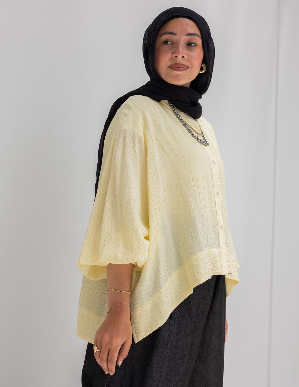 Elegant short blouse with buttons  in Yellow