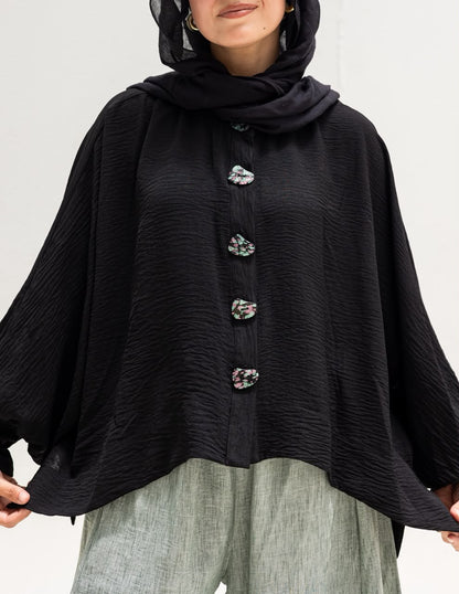Trendy blouse with buttons in Black