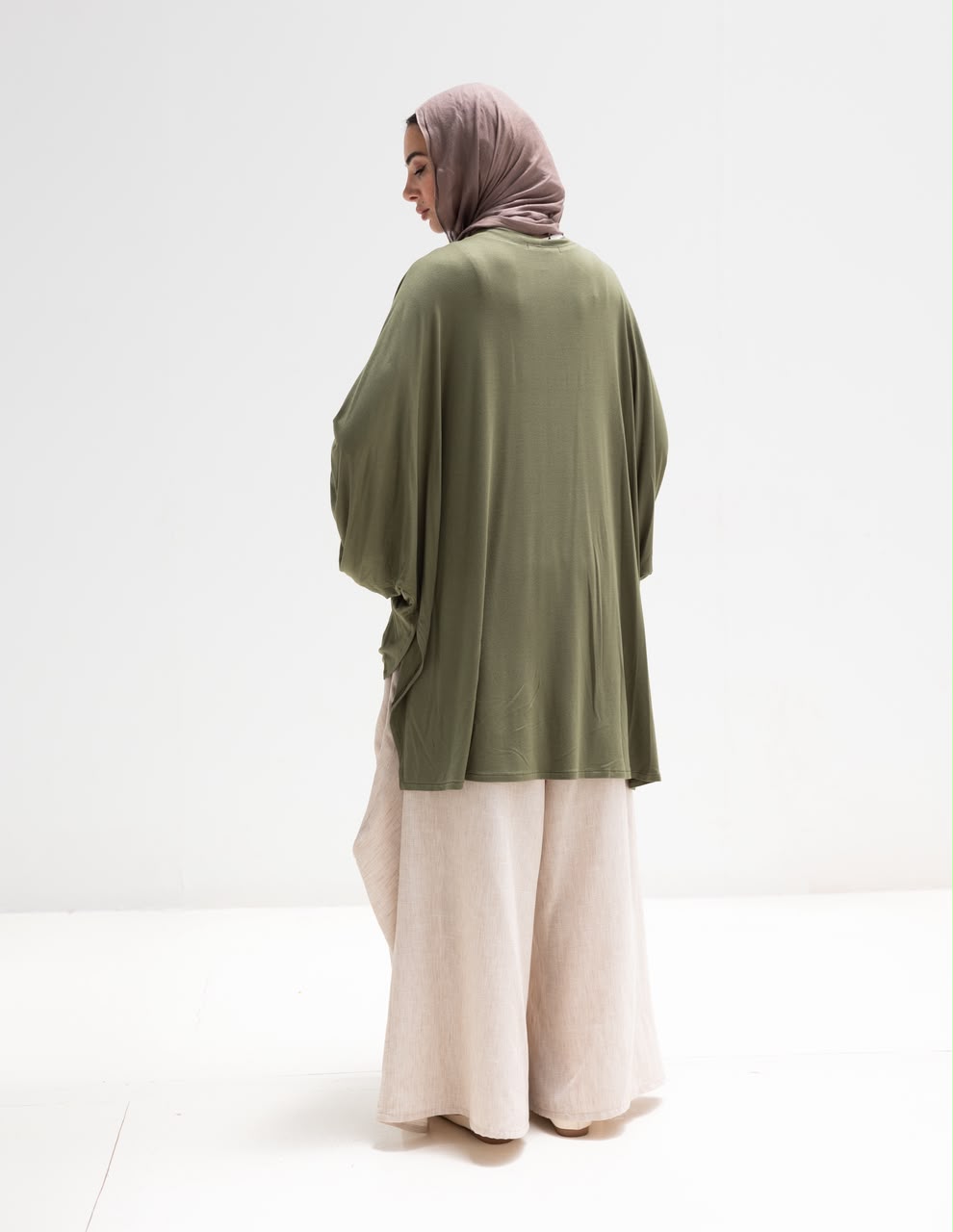 Soft light Lycra high low blouse  in Olive