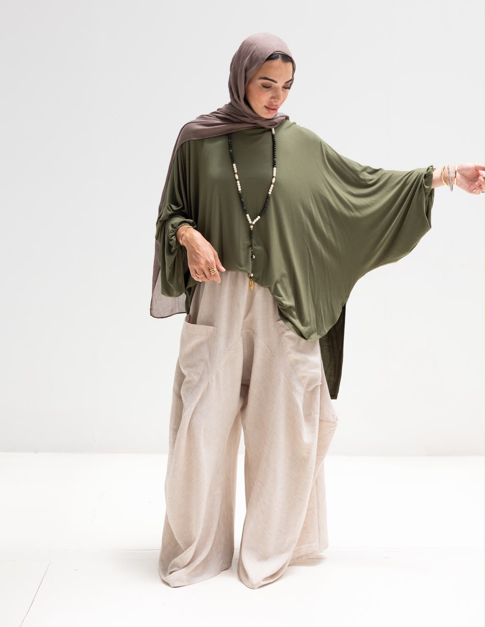 Soft light Lycra high low blouse  in Olive