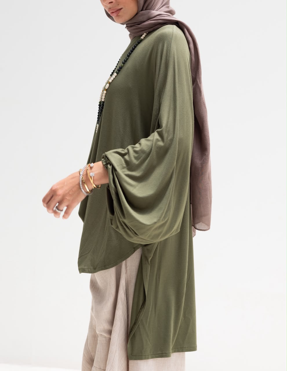 Soft light Lycra high low blouse  in Olive