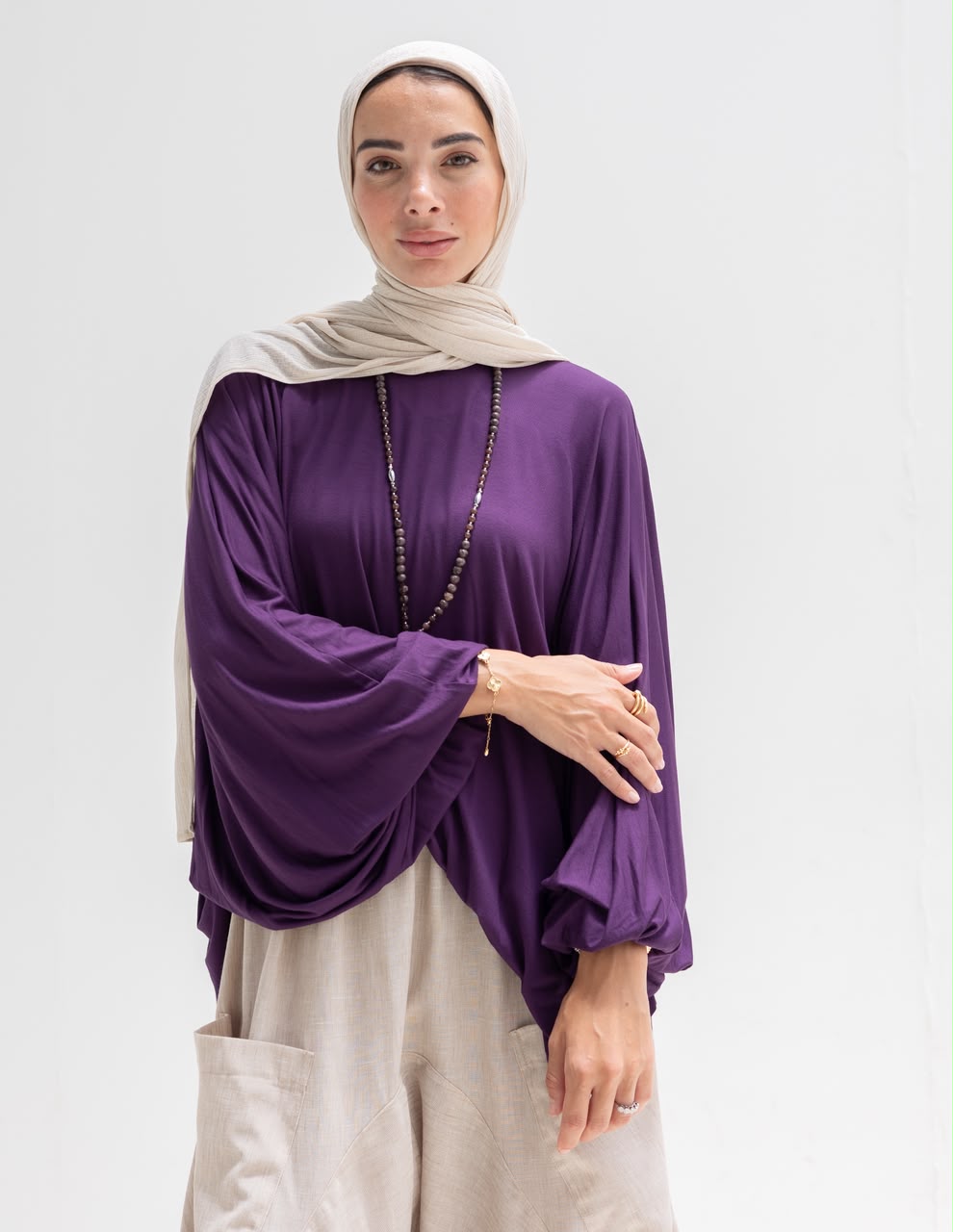 Soft light Lycra high low blouse  in Purple