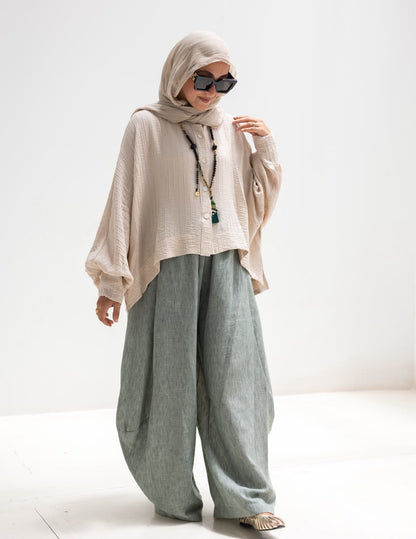 Trendy blouse with buttons  in beige