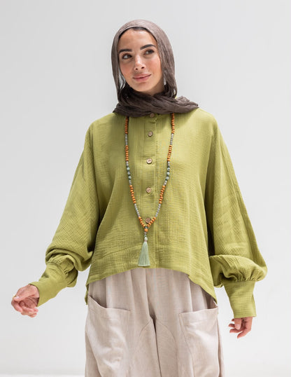Trendy blouse with buttons  in pistachio