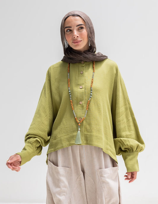Trendy blouse with buttons  in pistachio