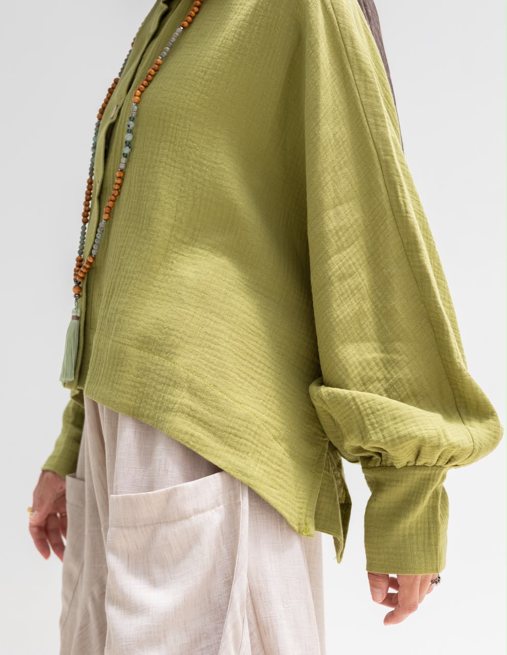 Trendy blouse with buttons  in pistachio