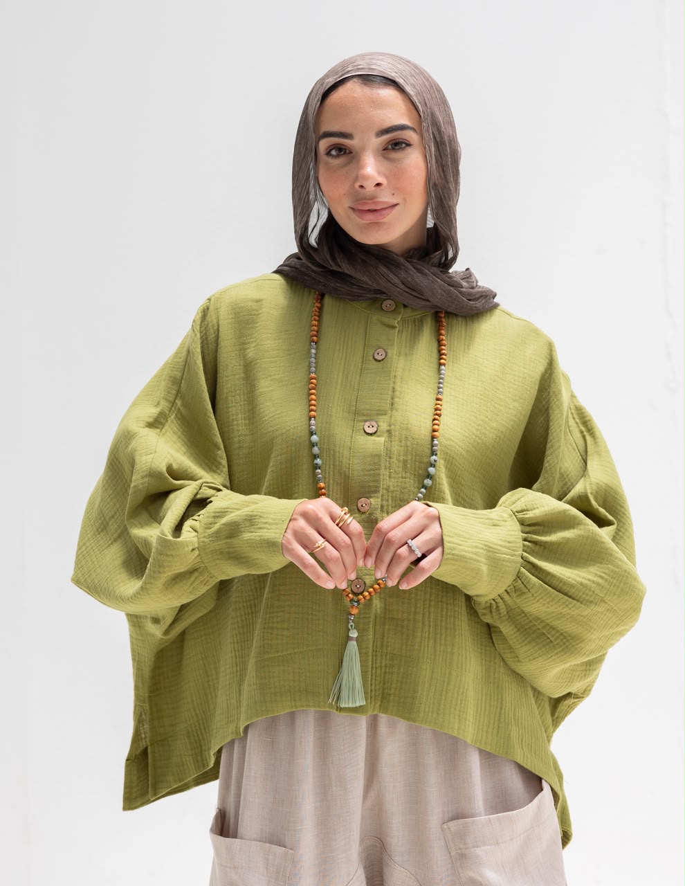 Trendy blouse with buttons  in pistachio