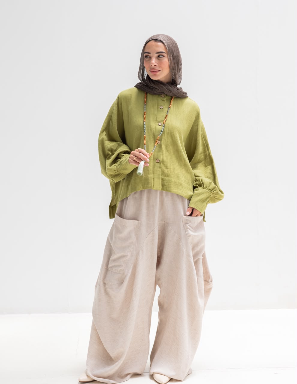 Trendy blouse with buttons  in pistachio
