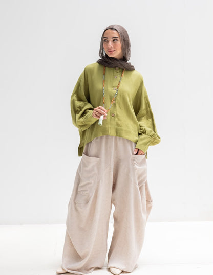 Trendy blouse with buttons  in pistachio