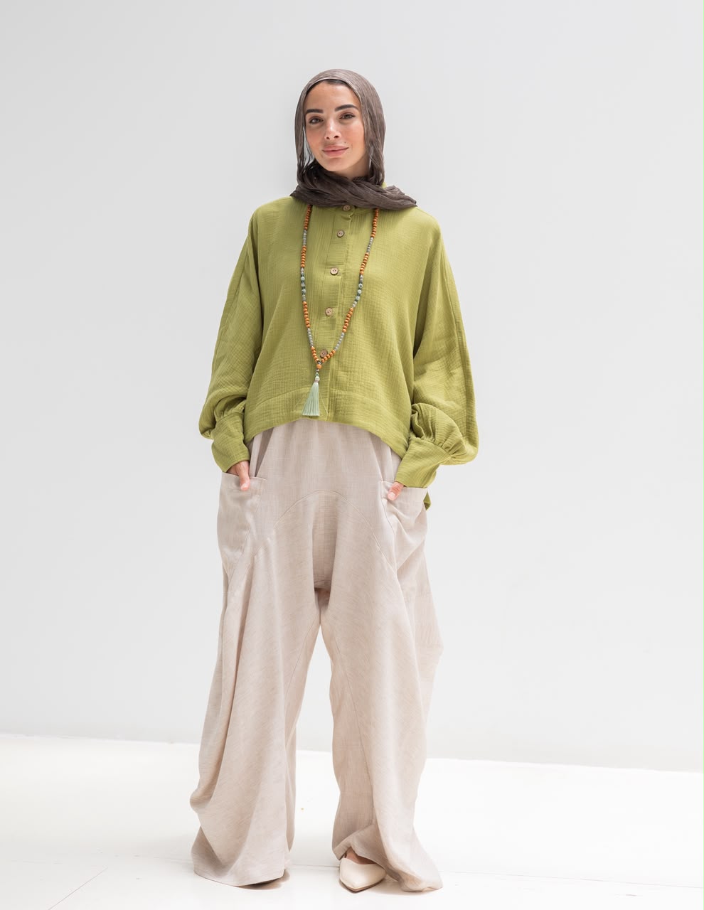 Trendy blouse with buttons  in pistachio