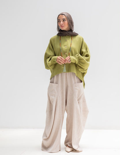 Trendy blouse with buttons  in pistachio