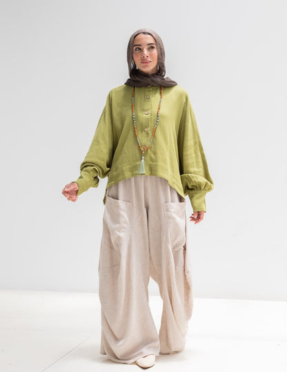 Trendy blouse with buttons  in pistachio