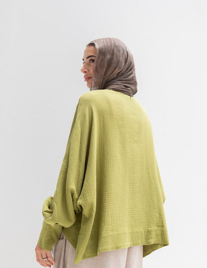 Trendy blouse with buttons  in pistachio
