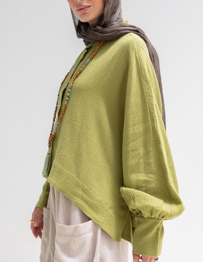 Trendy blouse with buttons  in pistachio