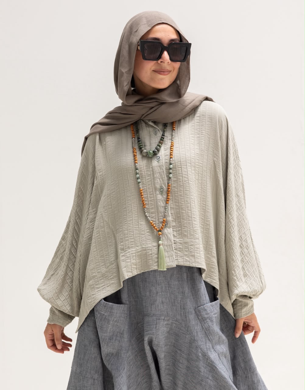 Trendy blouse with buttons  in light olive