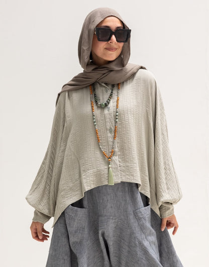 Trendy blouse with buttons  in light olive