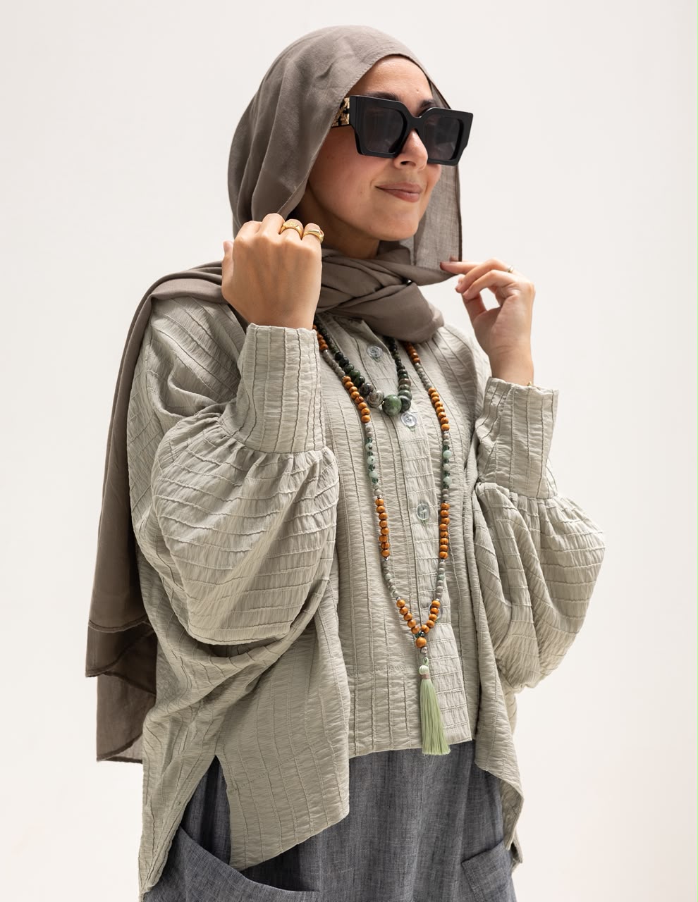 Trendy blouse with buttons  in light olive