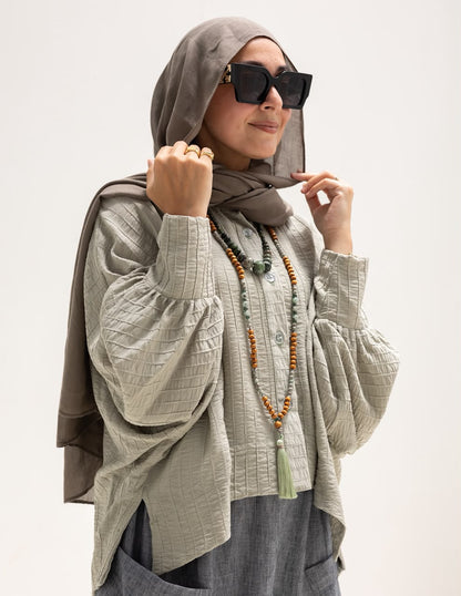 Trendy blouse with buttons  in light olive
