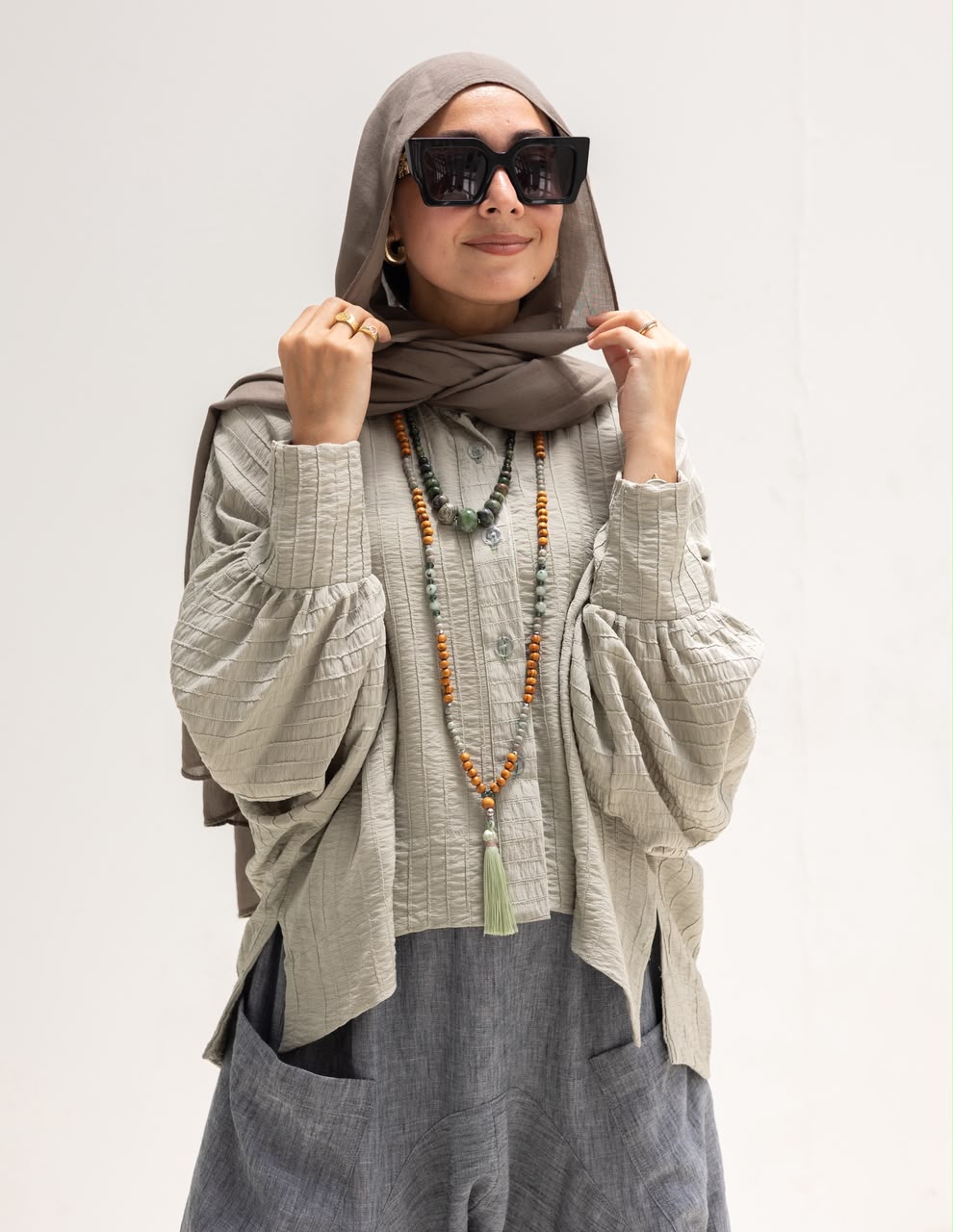 Trendy blouse with buttons  in light olive