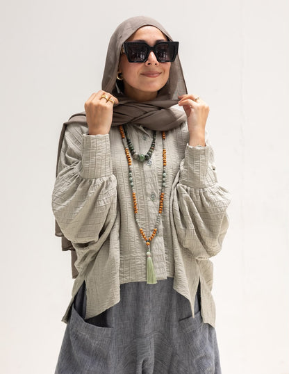 Trendy blouse with buttons  in light olive