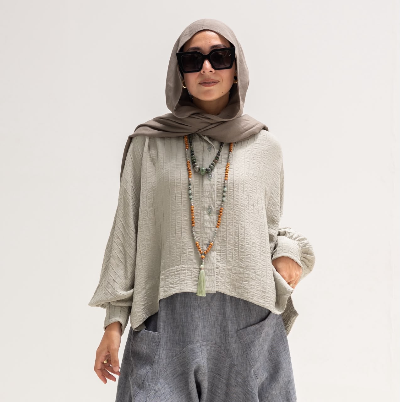 Trendy blouse with buttons  in light olive